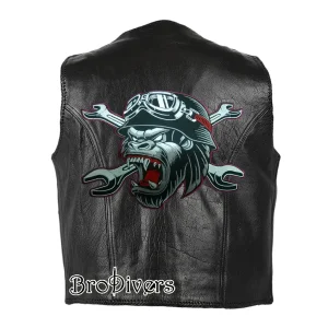 Custom gorilla mechanic embroidery patch on black leather biker vest